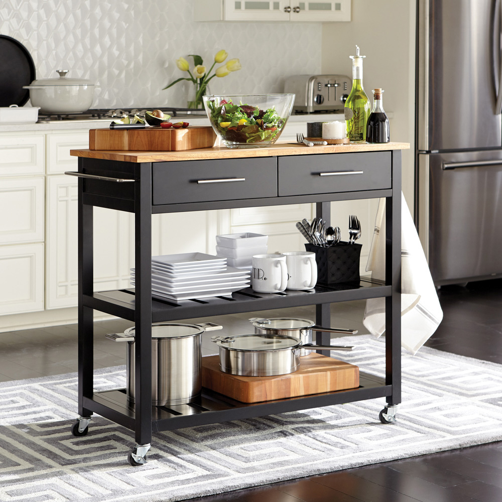 Rolling kitchen cart storing kitchen essentials