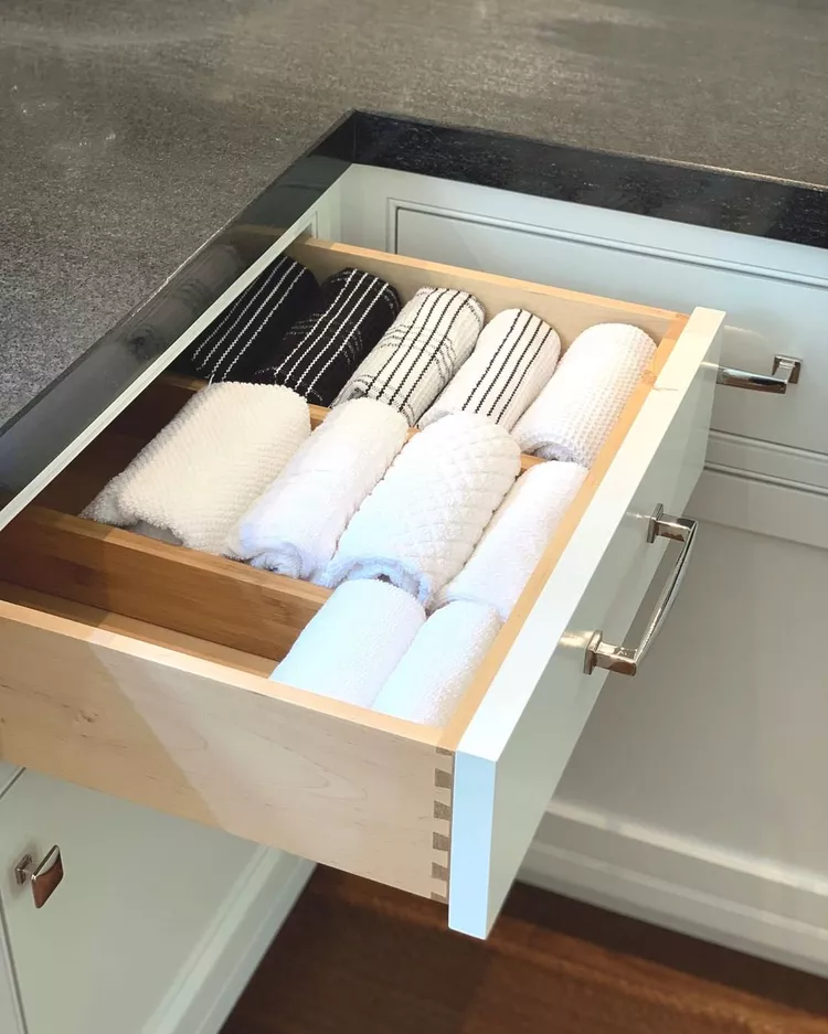 Storing kitchen towels in kitchen drawers