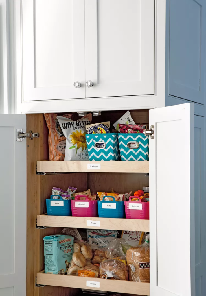 baskets placed inside kitchen cabinets