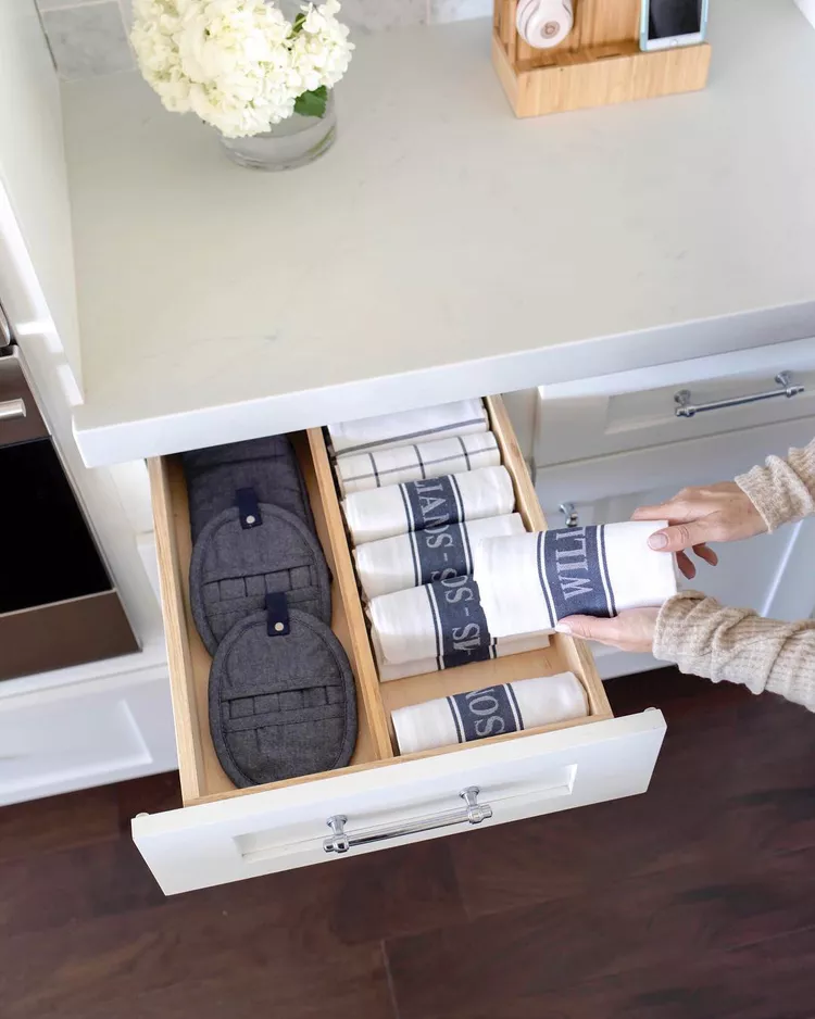Storing kitchen towels in drawers 